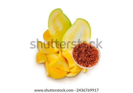 Mango, cut into bite-sized pieces, ready to eat. Ready to serve with dipping sauce, chili and salt, Thai style, Asian food. Royalty-Free Stock Photo #2436769917