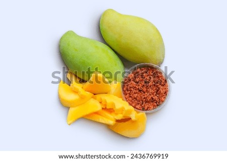 Mango, cut into bite-sized pieces, ready to eat. Ready to serve with dipping sauce, chili and salt, Thai style, Asian food. Royalty-Free Stock Photo #2436769919