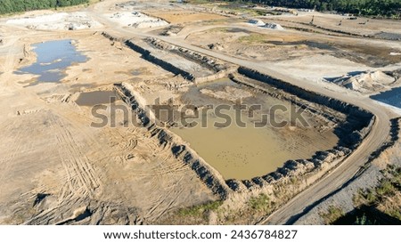 Drone aerial photograph of earthworks at a new construction site in the Nepean Business Park in the greater Sydney suburb of Penrith in New South Wales in Australia Royalty-Free Stock Photo #2436784827