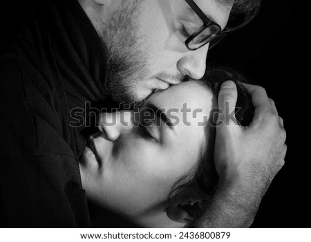 Portrait of a loving couple in profile. Black and white portrait.
