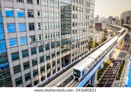 Tokyo, Japan cityscape and monorail. Royalty-Free Stock Photo #243680821