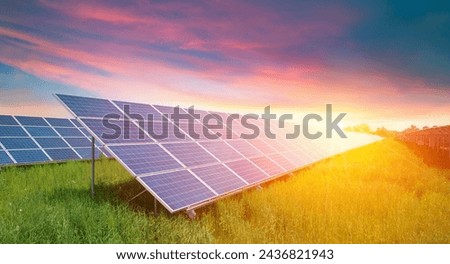 Photo collage of sunset and solar panel, photovoltaic, alternative electricity source - concept of sustainable resources. High quality photo