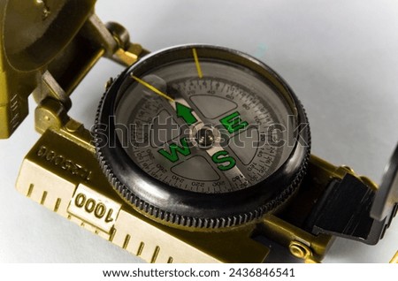 One military compass on a white background