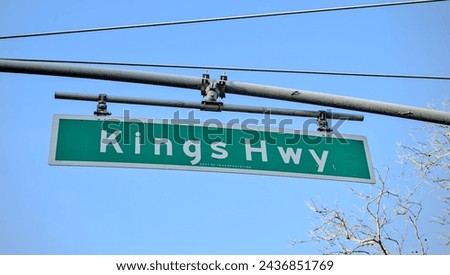 kings hwy sign on a street light lamp post (highway marking in brooklyn new york midwood)
