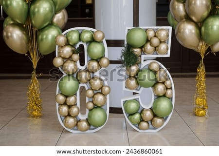 85 years decorated with balloons Royalty-Free Stock Photo #2436860061