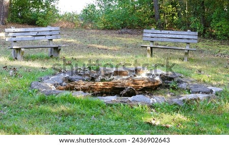 a fire pit in a campground.