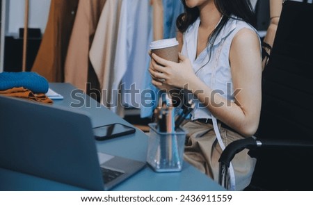 Young woman small business owner working at home office. Online marketing packaging delivery, startup SME entrepreneur or freelance woman concept. Small business owener