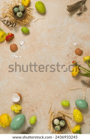 Easter holiday vertical border frame background with easter eggs and spring flowers. Top view, flat lay composition