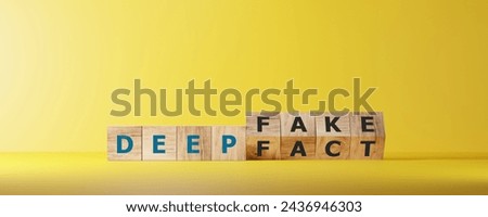 Dice form the words DEEPFAKE on wooden cube block. Deepfake concept matching facial movements.