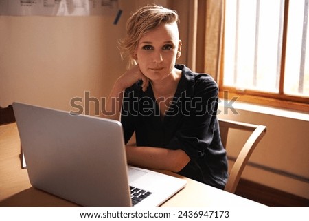 Portrait, businesswoman and laptop in home office with confidence, technology and freelancer for remote work. Person, editor and pride face with computer by workspace for productivity and online blog