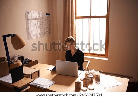 Workspace, businesswoman and laptop in home office with confidence, above and freelancer with productivity. Professional, editor and writing a book in remote work and computer for online research