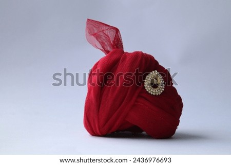 indian  Traditional Headgear Pagdi isolated on white background Royalty-Free Stock Photo #2436976693