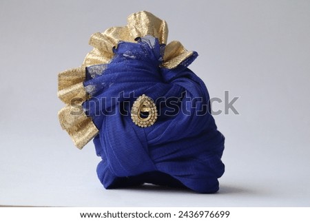 indian  Traditional Headgear Pagdi isolated on white background Royalty-Free Stock Photo #2436976699