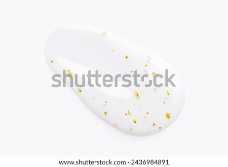 serum gel essence texture with gold closeup on a light background