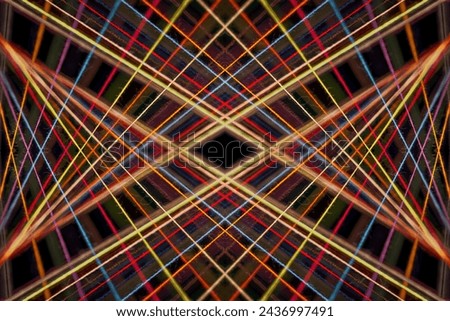 Converging Multi-colored Sewing Thread on a black background Royalty-Free Stock Photo #2436997491