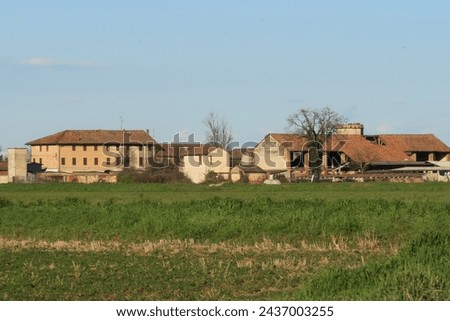 Farmstead farm landscape Po Valley nature natural naturalistic history tourism culture Italy Italian Europe Royalty-Free Stock Photo #2437003255