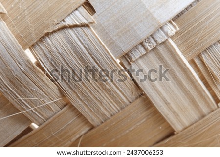 Texture of a chipped woven bamboo. This is the first variation to pictures taken of this object.