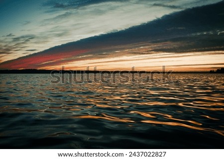 Beautiful sunset with reflection over the water