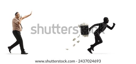 Full length profile shot of a security officer with a walkie talkie chasing a burgler with money in a case isolated on white background