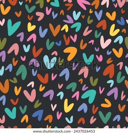 Seamless pattern with colorful hearts on black background. Vector