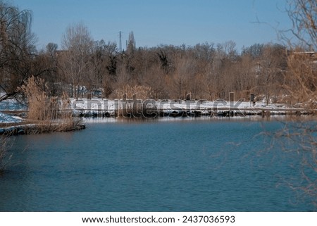 river bank with snow-covered banks. High quality photo