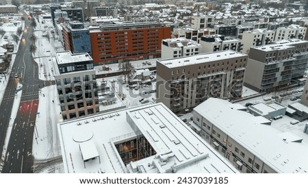 Drone photography multistory houses in a city during winter cloudy day