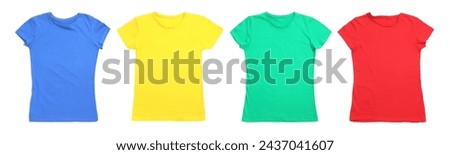 T-shirts of different colors isolated on white. Space for design
