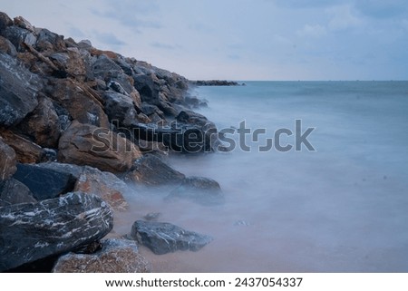 Breakwater in the sea in the morning and long exposure photography