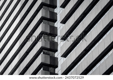 Skyscrapper with abstract windows. Modern architecture facade. Business concept