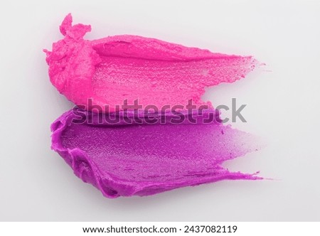 Colored cosmetic creamy skin care lotion texture. A smear of paint. Hair conditioner, smear on a colored background. Cream cosmetic product close up. Shampoo, balm. Ointment. Pomade.