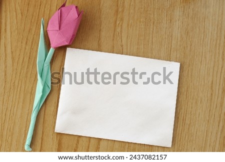 White note mock up with pastel paper tulips