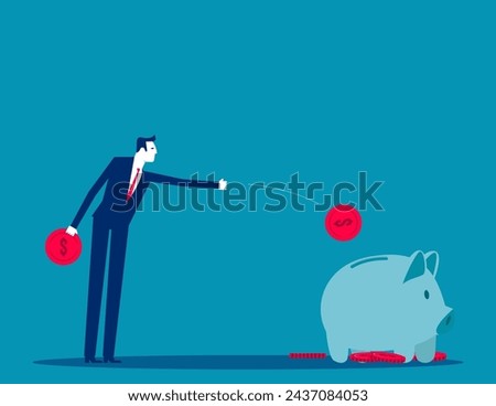 Businessman throw coins into a piggy bank. Cornhole game concept


