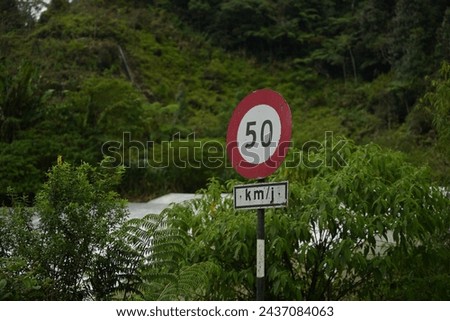 50kmh Speed Limit Malaysia Road Sign Cameron Highlands  Royalty-Free Stock Photo #2437084063