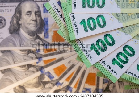 Fan of US 100 dollar and 100 euro banknotes for design purpose