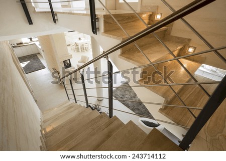 View of marble staircase in expensive house Royalty-Free Stock Photo #243714112