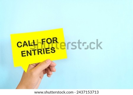 Human hand holding speech bubble with written phrase Call for Entries. Join contest invitation.