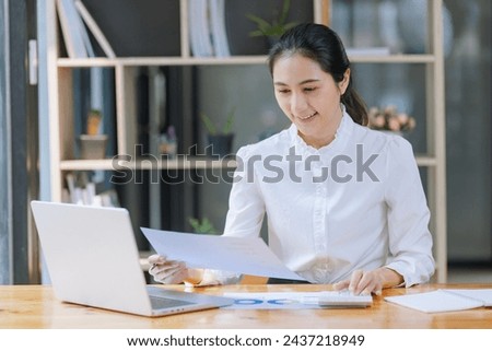 Business financial analytics data advisory concept. Businesswoman working on digital laptop computer with advisor showing plan of investment to clients at table office, Business marketing.