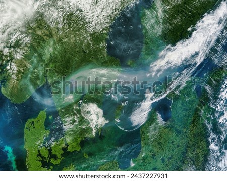 Smoke from Canadian fires over Scandinavia. Smoke from Canadian fires over Scandinavia. Elements of this image furnished by NASA.