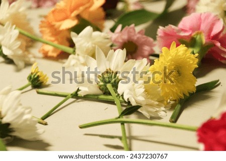 bouquet of many of  flowers spread on the table floor 