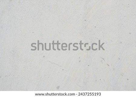 Weathered Concrete Wall with Rust Stains