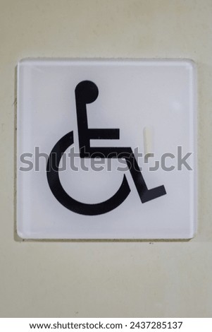 Handicapped wheelchair access logo sign.disable sign.difable sign.