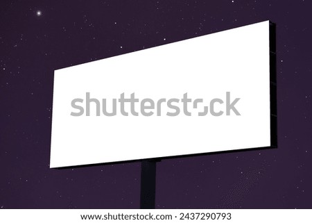 Mock up: blank white billboard or large display against the dark sky with stars at night. White screen, template, mockup and copyspace concept