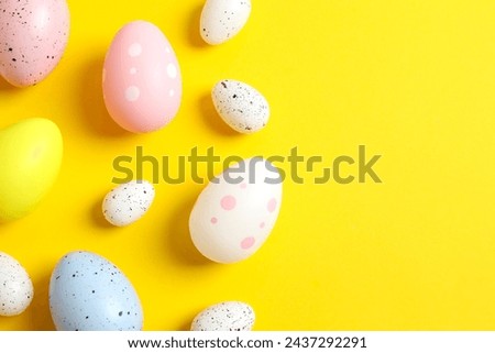 Easter decor concept. Top view photo of easter eggs on color background
