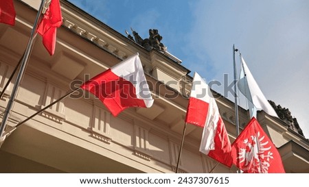 Polish National Flags Fluttering On A Building In The Heart Of Poznan, Poland