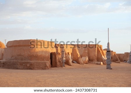 Set for a movie still stands in the Tunisian desert near Tozeur Royalty-Free Stock Photo #2437308731
