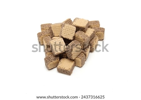 Bite-size wafers isolated on a white background. Royalty-Free Stock Photo #2437316625