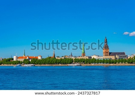 Panorama of riga including the Riga castle, cathedral and saint James church, Latvia. . Royalty-Free Stock Photo #2437327817