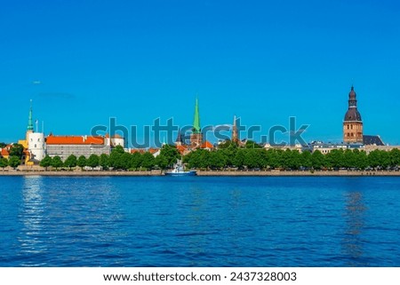 Panorama of riga including the Riga castle, cathedral and saint James church, Latvia. . Royalty-Free Stock Photo #2437328003