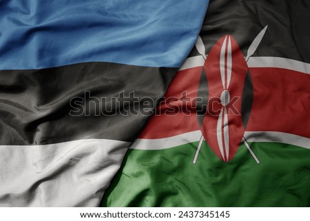 big waving national colorful flag of kenya and national flag of estonia. macro