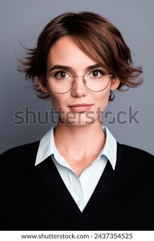 Vertical photo of happy positive woman secretary wear black waistcoat spectacles smiling isolated grey color background